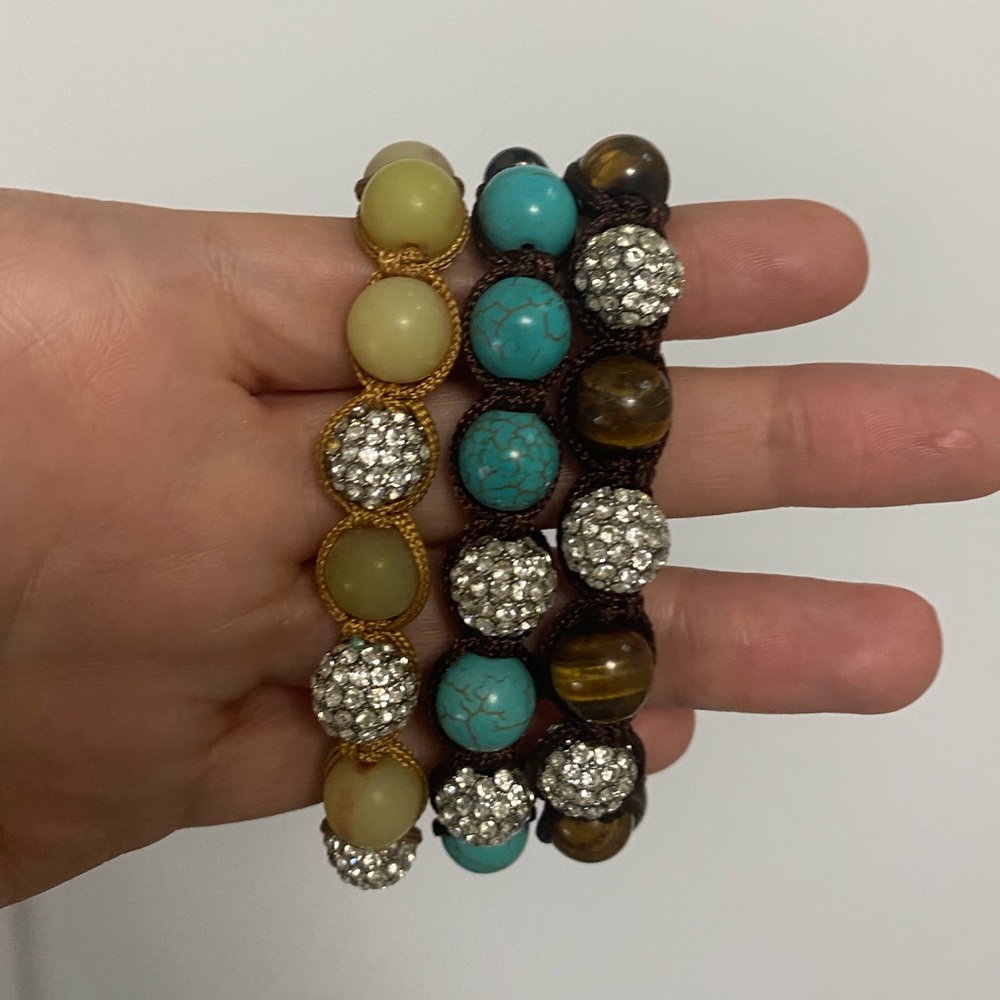 Set of 3 beaded bracelet adjustable sizing.